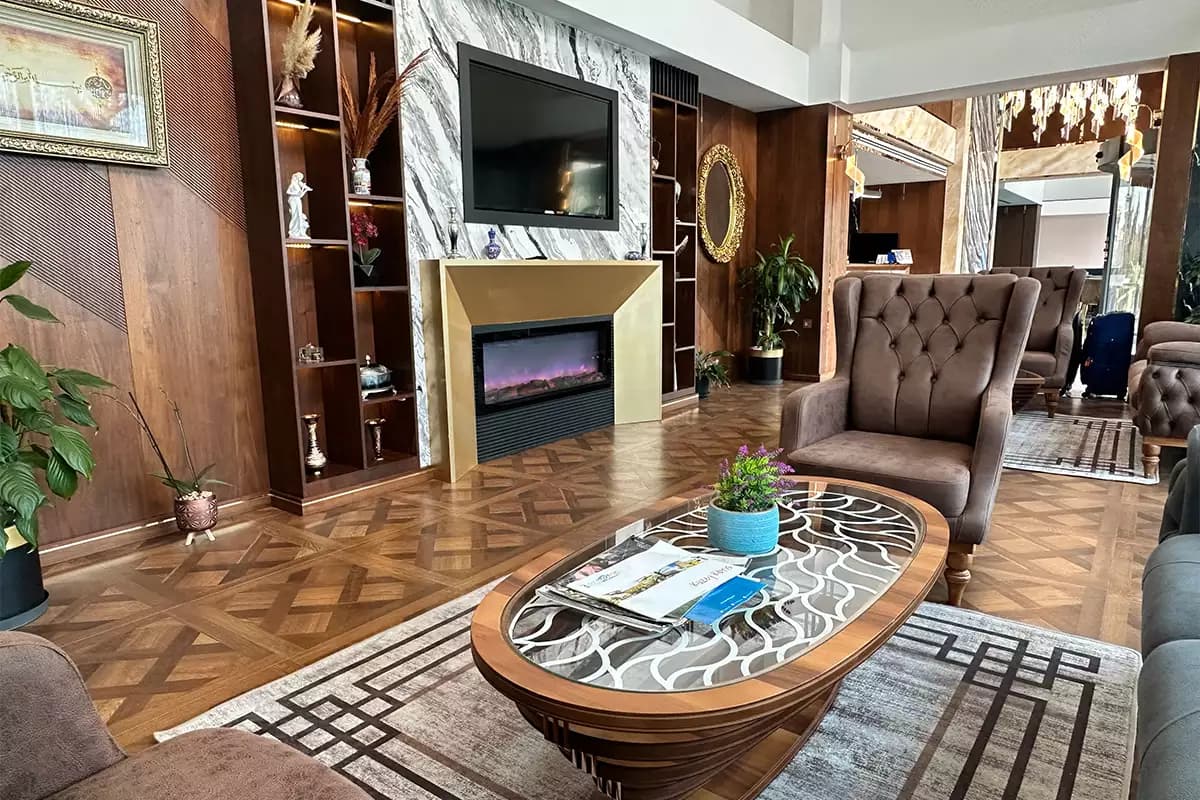 Fireplace and armchairs in the lobby